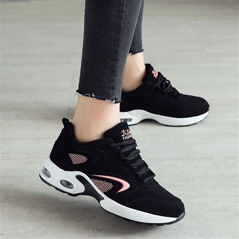 designer black sneakers for women.